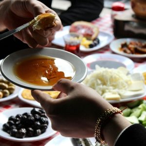 people sharing breakfast food